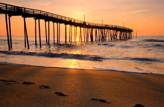 Sunrise over the pier at the Outer Banks NC.