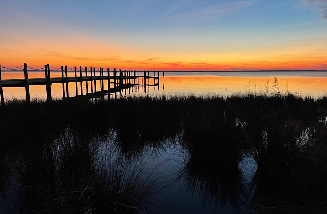 A weekend getaway to the Outer Banks isn't complete without a Duck sunset!